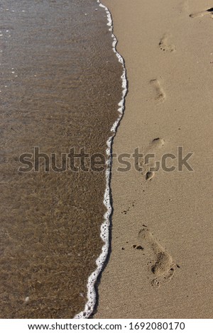 Similar – alone on 1ner island Ocean