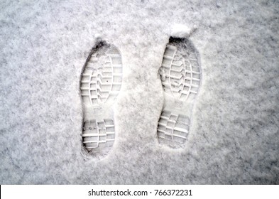 Footprints On Snow.