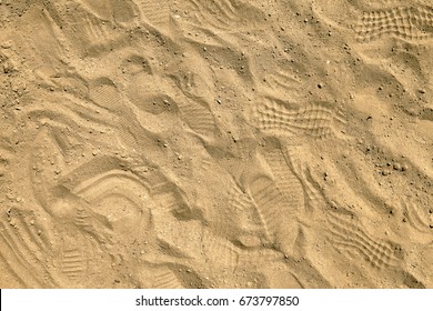 Footprints In Sand On Playpit. Top View. Sand In Sand-pit, Overhead Shot. Sandbox Background. Sandpit Desktop Background. Moulding Sand Quarry Desktop Picture. 