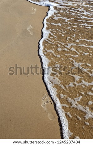 Similar – alone on 1ner island Ocean