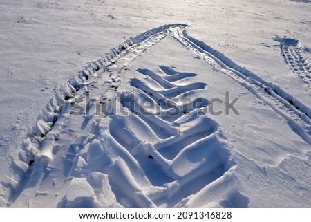 Similar – snow tracks Winter Ice