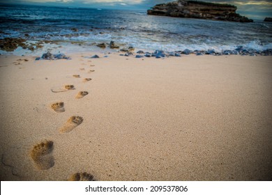 Footsteps In The Crisp Sand