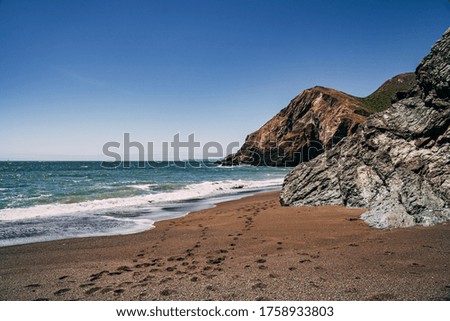 Similar – Aerial Drone View Of Blue Ocean Waves And Beautiful Sandy Beach Shore in Portugal