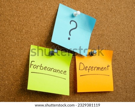 Forbearance and deferment concept. Stickers are pinned to the board.