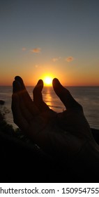 Forced Perspective Photography Image Of Bali Sunset