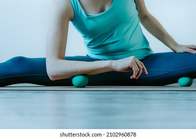 Forearm And Hamstring Muscles Myofascial Release With Therapy Massage Ball. Concept: Self Care Practices At Home, Computer Hand Relaxation, SMFR, Myoyin 