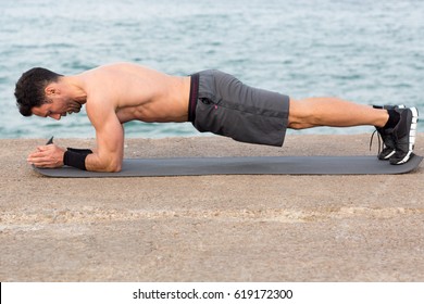 Forearm Plank Exercise Outside Close To The Beach