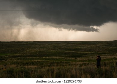 Foreboding scary thunderstorm building over open farmland over USA on spring afternoon