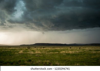 Foreboding scary thunderstorm building over open farmland over USA on spring afternoon
