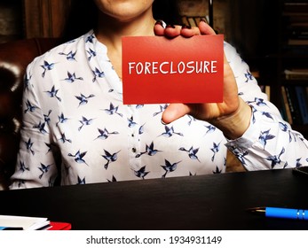  FORECLOSURE Inscription On The Page. Lender Attempts To Recover The Amount Owed On A Defaulted Loan By Taking Ownership Of And Selling The Mortgaged Property
