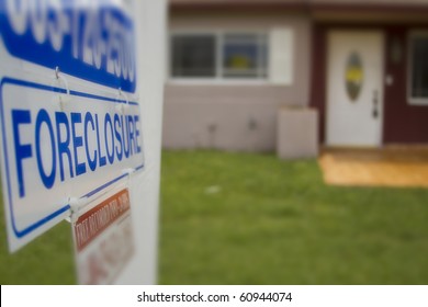 A Foreclosure Sign Outside Of A Condemned Home