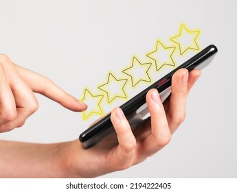 Forefinger Giving Five Star Feedback On Phone. Client Satisfaction Survey. Positive Customer Opinion. Good Service, Hotel, Application, Restaurant Evaluation. Marketing Concept. High Quality Photo