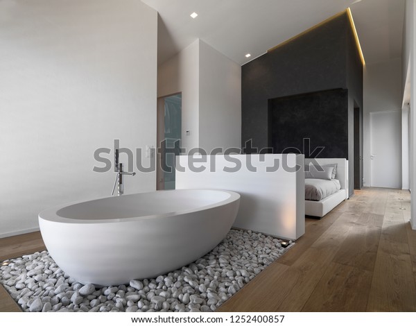 Foreground Modern Freestanding Bathtub On Small Stock Photo