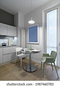 In The Foreground A Small Round Dining Table With Two Colored Chairs In The Modern White Kitchen The Floor Is Parquet The Light Is Entrusted To Suspended Chandelier Above The Table