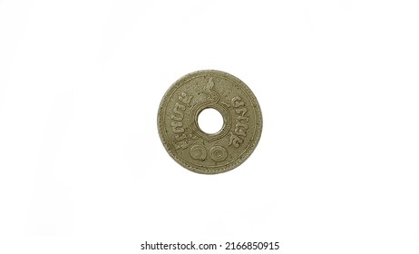 Foreign Currency Coins On A White Background.