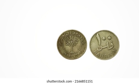 Foreign Currency Coins On A White Background.