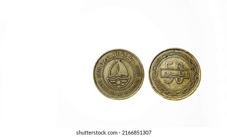 Foreign Currency Coins On A White Background.