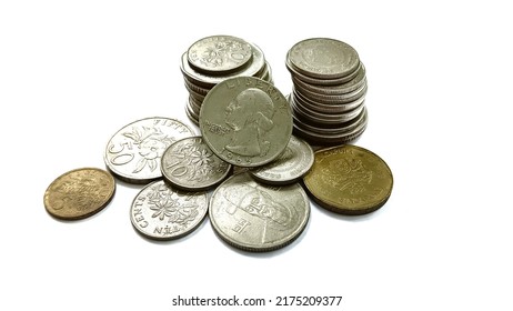 Foreign Currency Coins On A White Background.