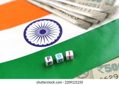 Foreign Direct Investment In India. The Abbreviation FDI On The Background Of The Indian Flag.