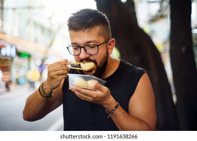 Foreigner Eating Baozi On The Street In China