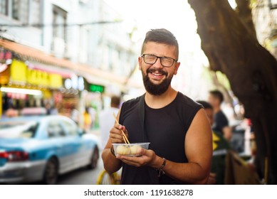 Foreigner Eating Baozi On The Street In China