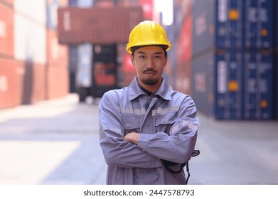 Foreman checking goods, loading boxes, containers, engineer or worker with hard hat working at shipping site and inspecting industrial cargo ship.