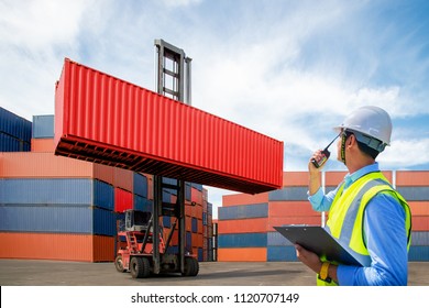 Foreman control loading containers box from cargo freight ship for import export, Foreman control industrial container cargo freight ship, Business logistic concept, Import and export concept