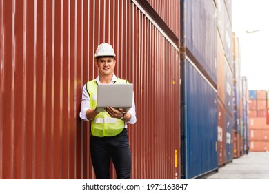 Foreman holding document, walking and checking the containers box from cargo ship for export and import