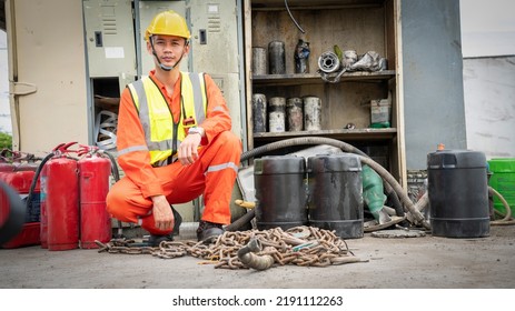 Foreman Maintenence Smile Sit Down At Maintenance Shop In Warehouse