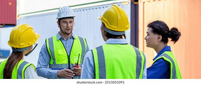 Foreman or worker work at Container cargo site check up goods in container. Foreman or worker checking on shipping containers. Logistics and shipping	