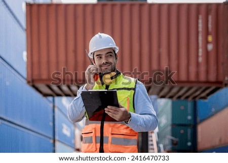 Foreman or worker work at Container cargo site check up goods in container. Foreman or worker checking on shipping containers. Logistics and shipping	