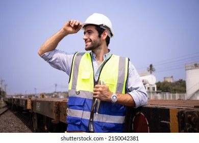 Foreman,specialist In Rail Transport. Standing Wearing A Hard Hat Ready To Work On Maintenance Of Machines.Handsome Young Engineer From The Middle East In Europe In The Train Garage.
Vision,leadership