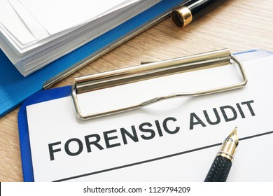 Forensic Audit And Financial Documents On A Desk.