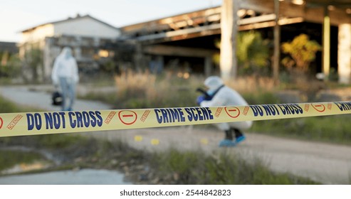 Forensic, people and crime scene for evidence outdoor, dna investigation and murder inspection. Team, hazmat and equipment with photograph review, csi observation and documentation protocol for case - Powered by Shutterstock