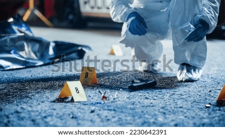 Forensics Finding Murder Weapon on Crime Scene at Night and Packing it in Professional Bag. Specialist Sending Gun to Lab to Look for Trace Evidence. Gang Fire Exchange Led to Mass Shooting