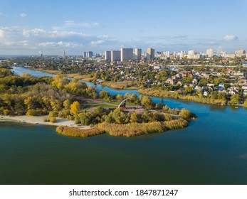 Forest Or Grove On Cape Between Two Rivers. Aerial View