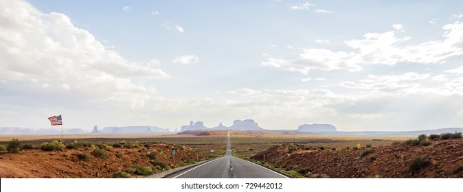 Forest Gump Point with Navajo American flag - Monument Valley scenic panorama on the road - Arizona, AZ, USA - Powered by Shutterstock
