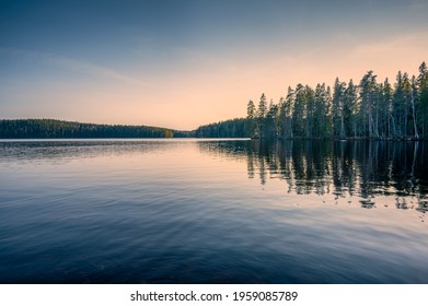 Forest Lake In Sweden On A Spring Late Afternoon, After Sunset. Bredsjön Lake In Stjärnfors Under A Blue-pink Soothing Sky. Relaxing Nature Image. Explore Scandinavia. 