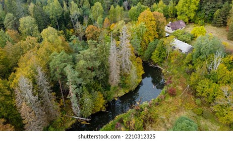 Forest And River At Sunset In Autumn. Aerial View Of Wildlife In Latvia, Europe