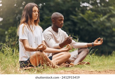 Forest yoga, nature meditation and couple in zen, relax or health mind training for energy wellness or peace. Interracial man or woman on floor in sustainability wood trees for mental health exercise - Powered by Shutterstock