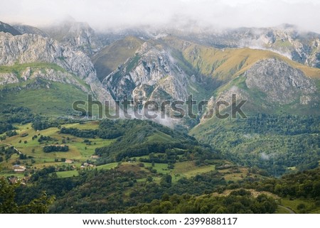Forests under the peaks of the Picos de Euro mountains, Spain Imagine de stoc © 