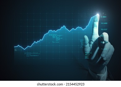 Forex market growth and business investing concept with man finger on digital touch screen with trading diagram and graphs on dark background