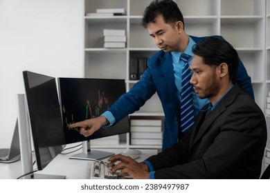 Forex traders Man in front of multiple computer monitors Automated computer monitor of business processes from financial stock analysis data graphs.