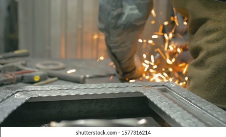 Forge workshop on table. Smithy manual production. Work on the product. Ruler, angle grinder. The blacksmith makes iron products for manufacture of fireplaces, stoves. - Powered by Shutterstock