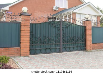 Forged automatic gates in a private house
