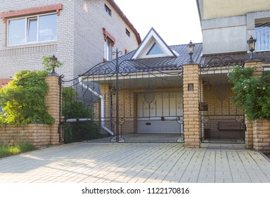 Forged Automatic Swing Gates In A Private House