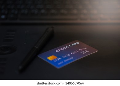 Forget the credit card placed on the computer device at the desk.