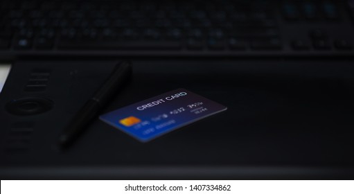 Forget the credit card placed on the computer device at the desk.