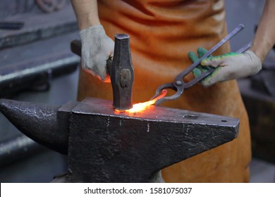 Forging An Iron Handmade Product In A Craft Forge Workshop