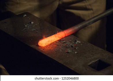 forging an iron rod on the anvil - Powered by Shutterstock